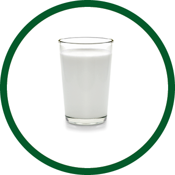fresh milk in the glass on white background