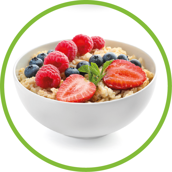 Bowls of oatmeal with berries and fruits on white background