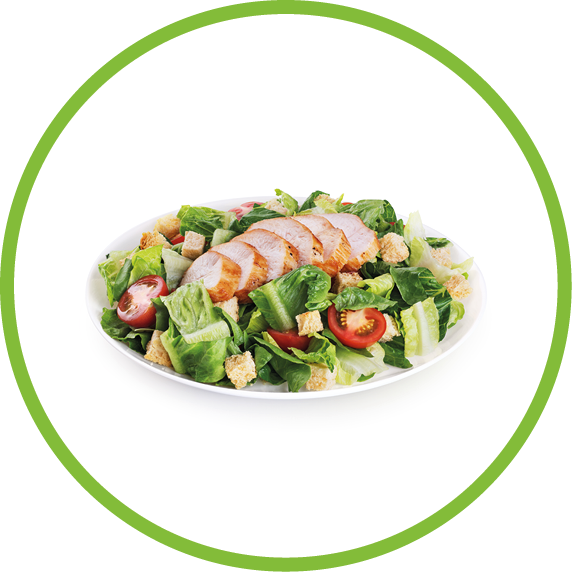 Caesar salad with chicken fillet isolated on white background. With clipping path.