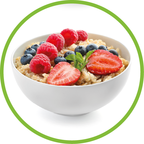 Bowls of oatmeal with berries and fruits on white background