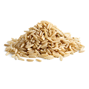 Pile of long grain brown rice isolated on white.