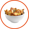 Bowl with tasty potato wedges on white background