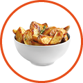Bowl with tasty potato wedges on white background