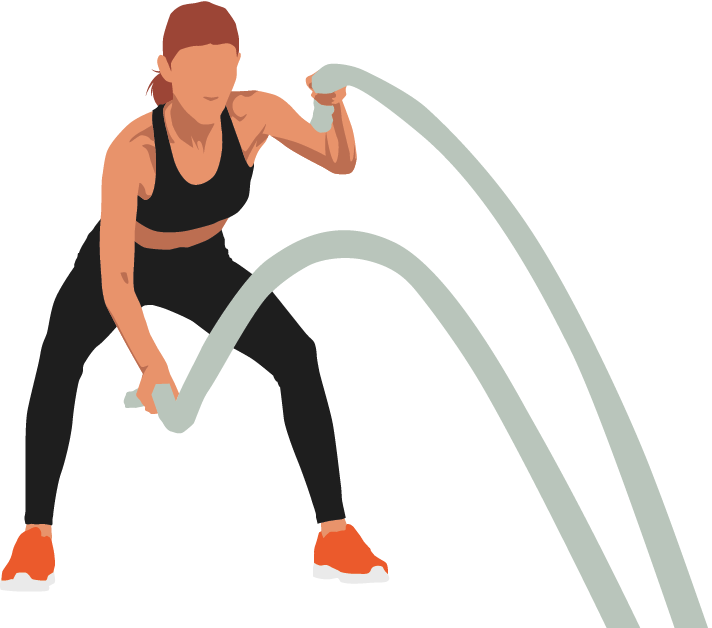 Female athlete working out using large ropes for upper body strength