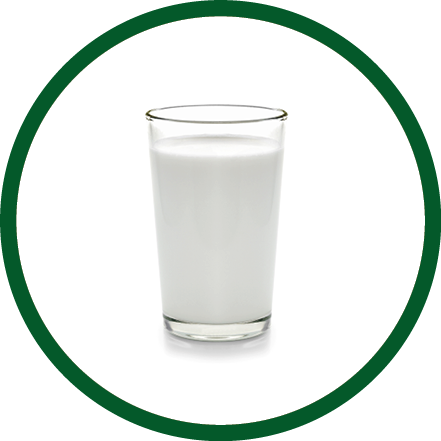 fresh milk in the glass on white background