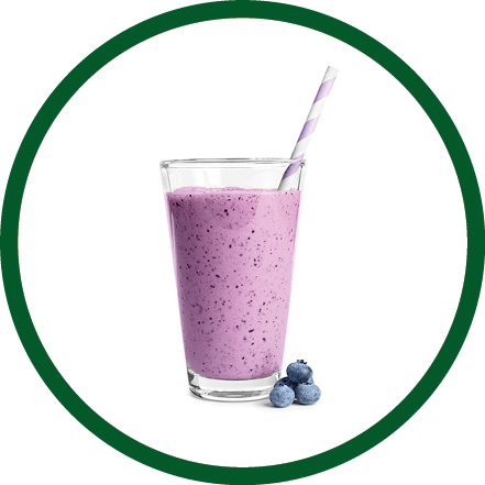 Tasty blueberry smoothie in glass on white background