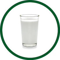 fresh milk in the glass on white background