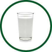 fresh milk in the glass on white background
