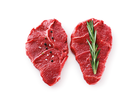 Fresh raw beef steaks, pepper and rosemary isolated on white background. With clipping path.