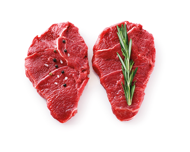 Fresh raw beef steaks, pepper and rosemary isolated on white background. With clipping path.