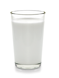 fresh milk in the glass on white background