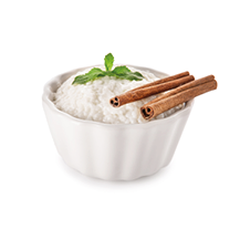 Delicious rice pudding with cinnamon in bowl on white background