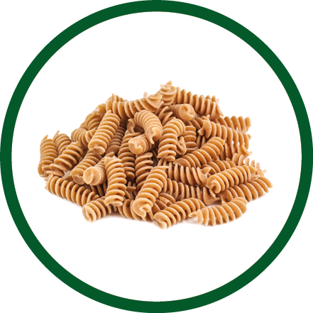 heap of whole wheat pasta on white background