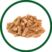 heap of whole wheat pasta on white background
