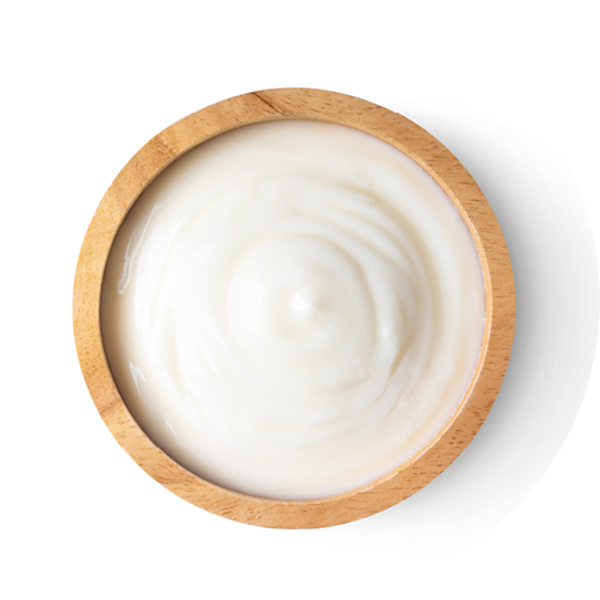 wood bowl of yogurt isolated on white background from top view