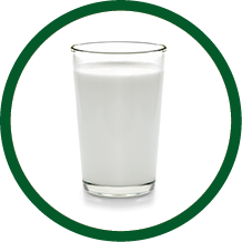 fresh milk in the glass on white background