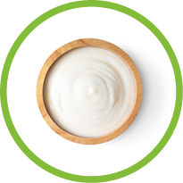 wood bowl of yogurt isolated on white background from top view