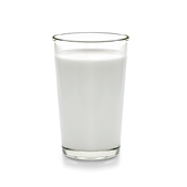 fresh milk in the glass on white background