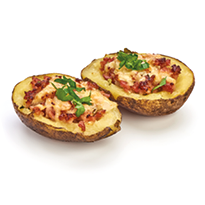 Stuffed baked potatoes with bacon and cheese, close-up, isolated on white background.