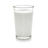 fresh milk in the glass on white background