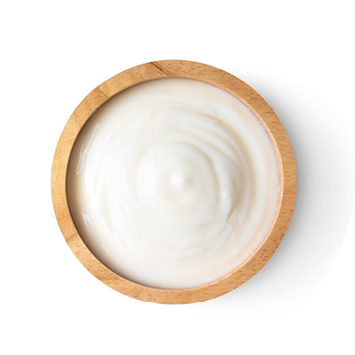 wood bowl of yogurt isolated on white background from top view